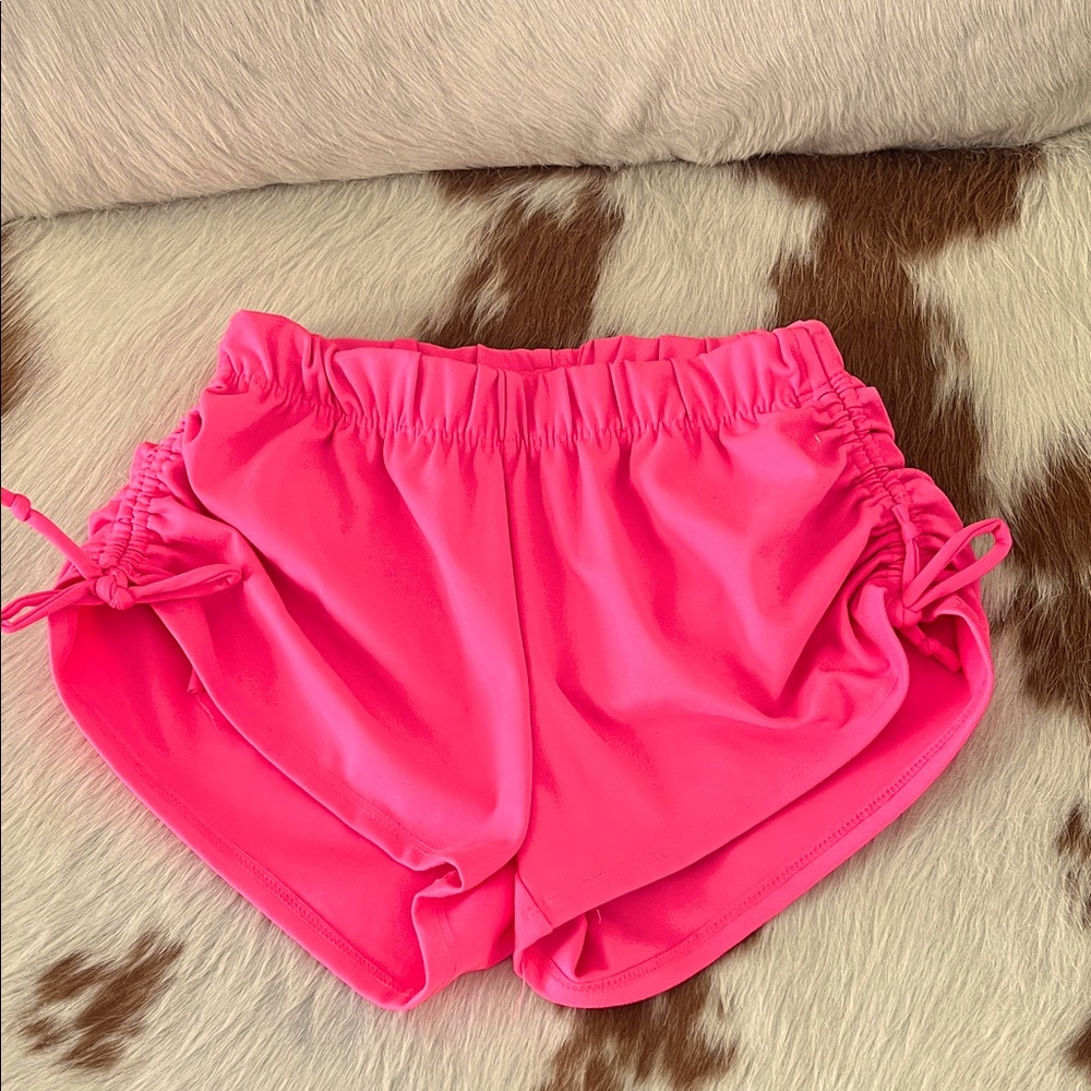 Five dance wear shorts, bright pink size XSmall.